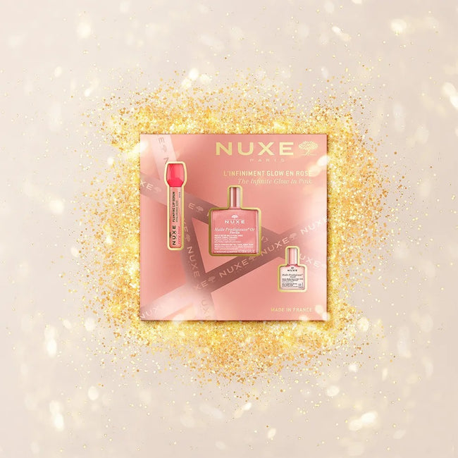 Nuxe The Infinite Glow In Pink zestaw suchy olejek z drobinkami 50ml + nawilżające serum powiększające usta 8ml + suchy olejek 10ml